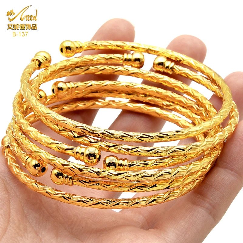 Luxurious African Jewelry: Gold-Toned Copper Bangle Bracelet for Women - Flexi Africa - Flexi Africa offers Free Delivery Worldwide - Vibrant African traditional clothing showcasing bold prints and intricate designs